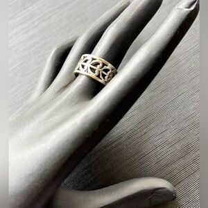 Silver Openwork Heart Band Ring
Size 7
Like New